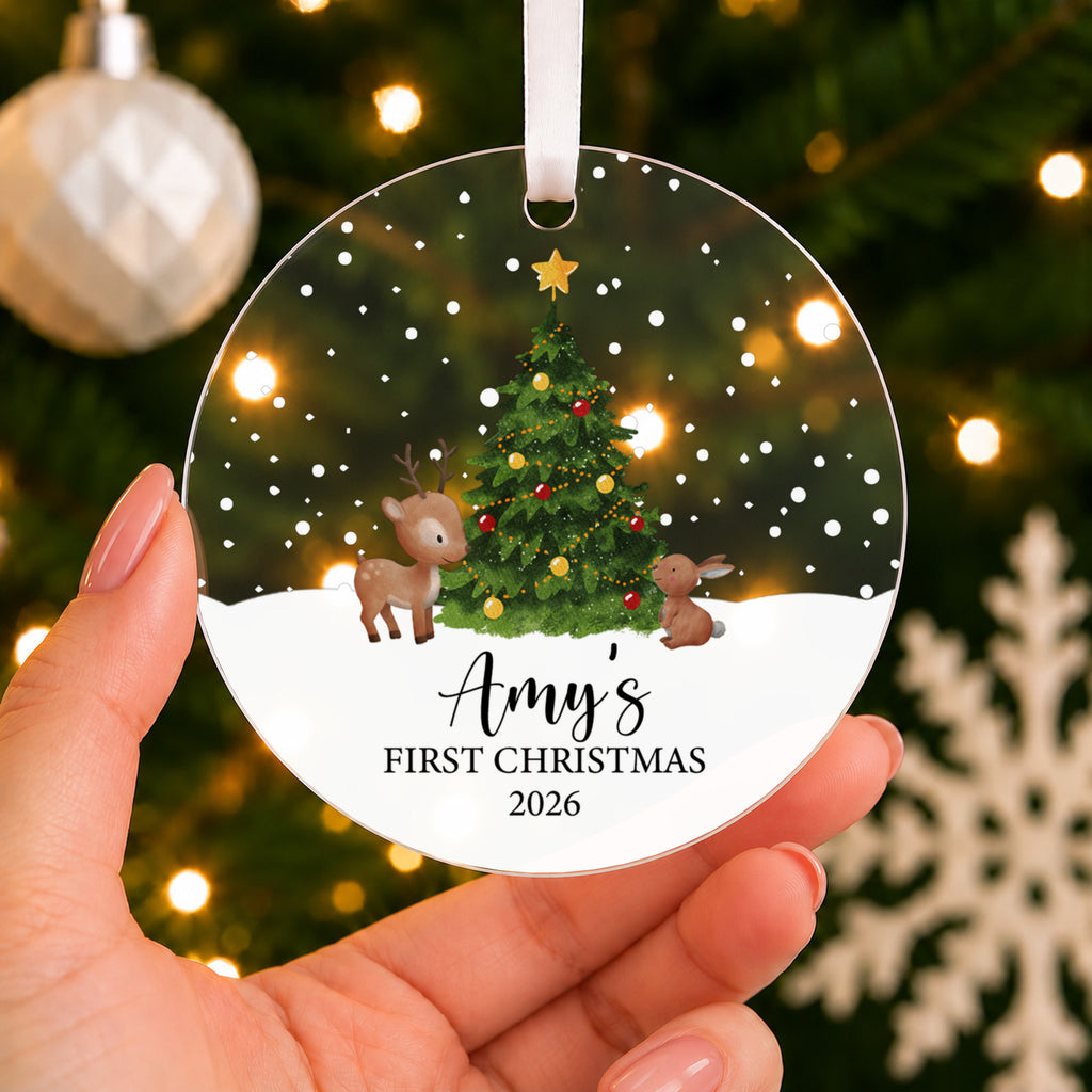 Personalised Baby's First Christmas Bauble – Christmas Tree Design – shown held in the hand