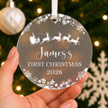 Personalised Baby's First Christmas Bauble – Santa Sleigh Design – shown held in the hand