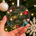 Personalised First Christmas Together Bauble – Heart Wreath Design – shown held in the hand