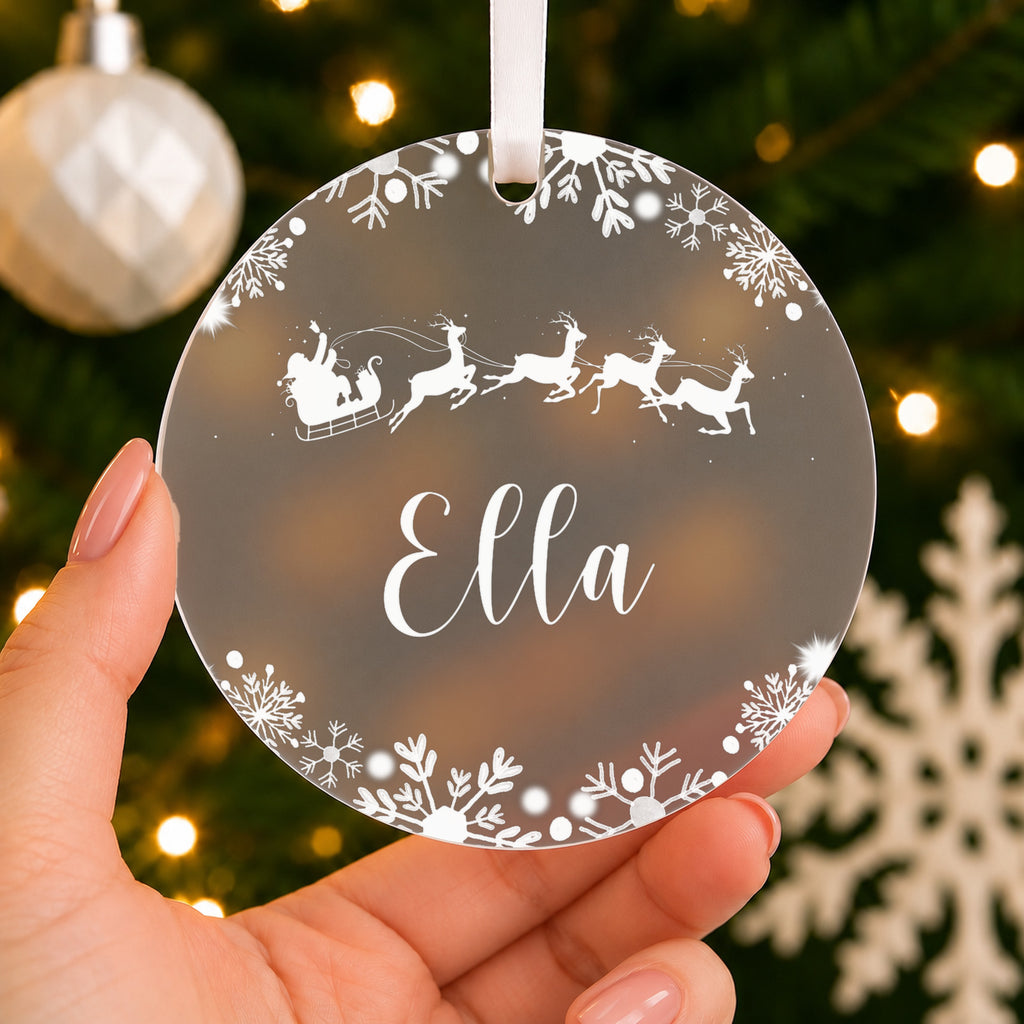 Personalised Name Christmas Bauble – Santa Sleigh Design – shown held in the hand