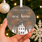 Personalised First Christmas in Your New Home Bauble – Names & Year – shown held in the hand