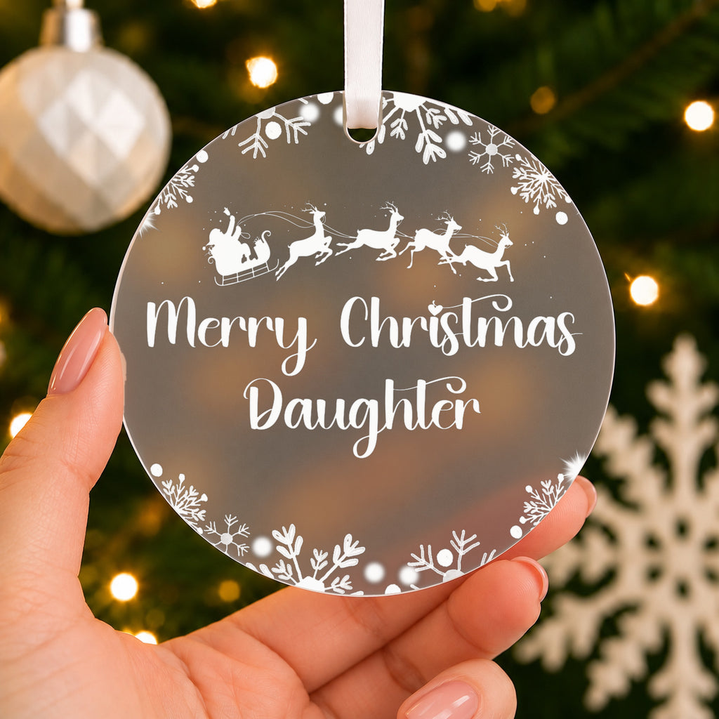 Personalised Son or Daughter Christmas Bauble – Santa Sleigh Design – shown held in the hand