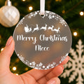 Personalised Niece or Nephew Christmas Bauble – Santa Sleigh Design – shown held in the hand