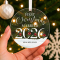 Personalised First Christmas Married Bauble 2026 – Mr & Mrs Names – shown held in the hand