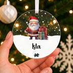 Personalised Father Christmas Bauble – Santa Design with Child's Name – shown held in the hand