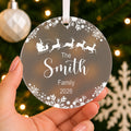 Personalised Family Name Christmas Bauble – Santa Sleigh Design – shown held in the hand