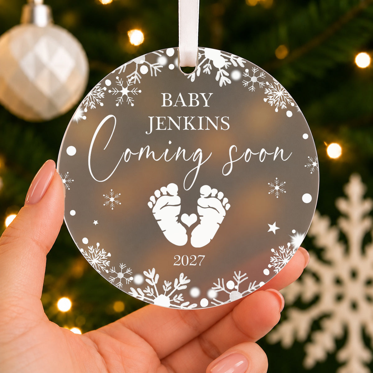 Personalised Baby Coming Soon 2027 Christmas Bauble – Pregnancy Announcement – shown held in the hand