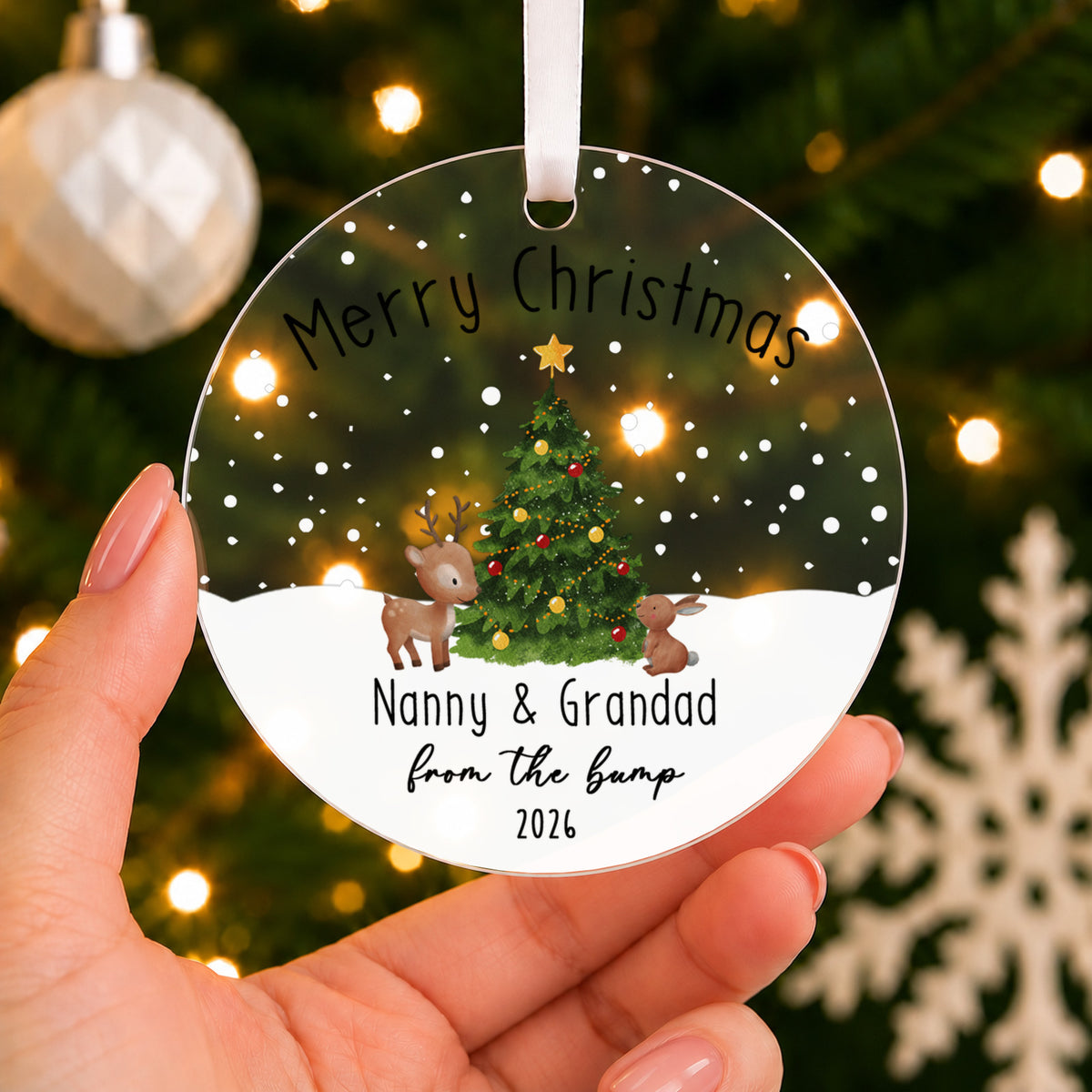 Personalised From the Bump Christmas Bauble – Gift for Grandparents-to-Be – shown held in the hand