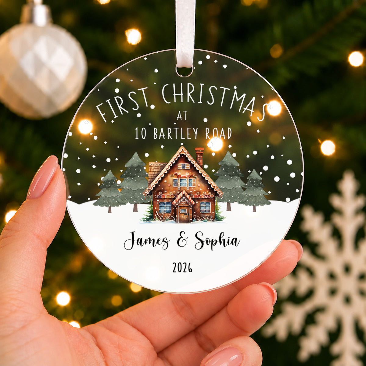 Personalised First Christmas New Home Bauble – Cottage with Your Address – shown held in the hand