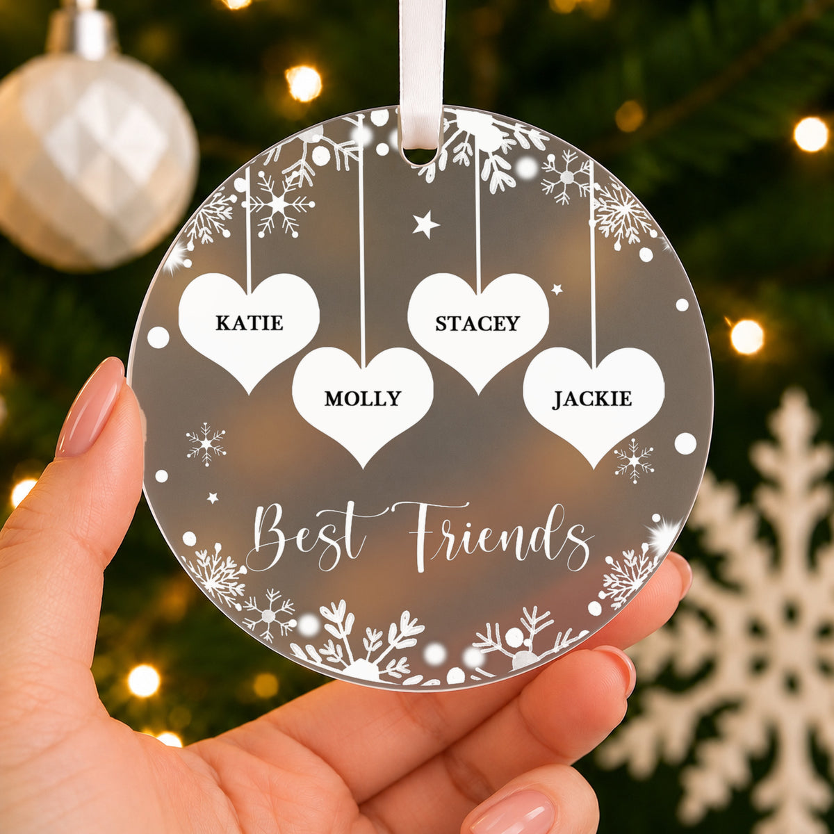 Personalised Best Friends Christmas Bauble – Two Hearts with Names – shown held in the hand