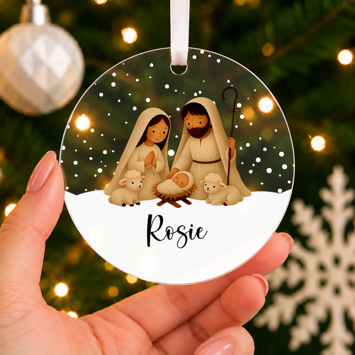 Personalised Nativity Christmas Bauble – Mary & Joseph with Baby's Name – shown held in the hand