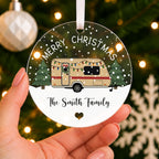 Personalised Caravan Christmas Bauble – Family Name Design – shown held in the hand