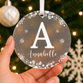 Personalised Initial & Name Christmas Bauble – White Snowflake Design – shown held in the hand